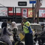 Anggota Satlantas Depok Banjir Pujian dari Warganet